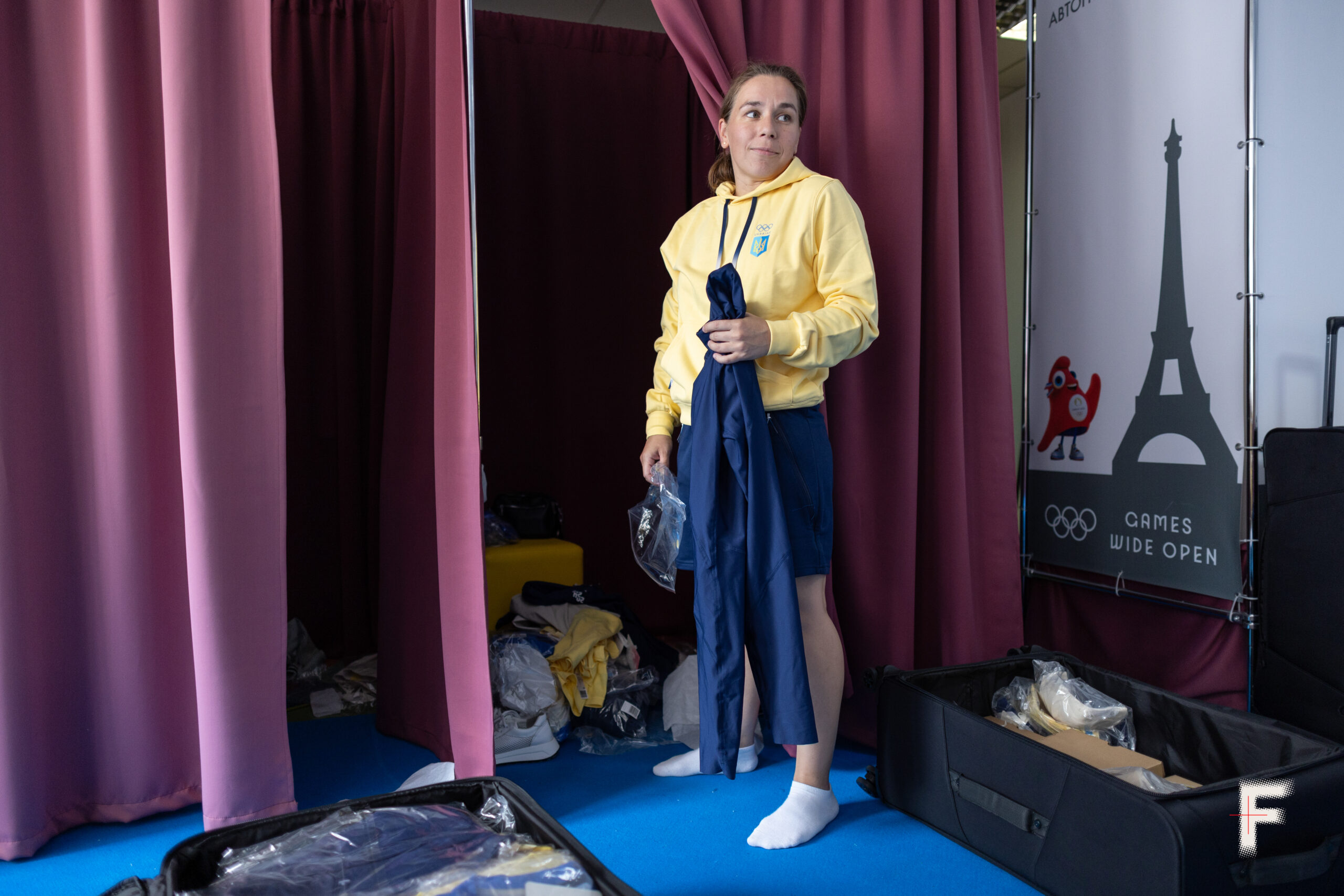 KYIV, UKRAINE - JULY 3: Ukrainian diver Viktoriya Kesar tries on the Ukrainian Olympic uniform at the central office of National olympic committee of Ukraine on July 3, 2024 in Kyiv, Ukraine. Ukraine will send more than 100 athletes to the 2024 Summer Olympic Games in Paris, a smaller number than it sent to the Tokyo 2021 games, before Russia's large-scale invasion. (Photo by Andriy Dubchak/Frontliner/Getty Images)